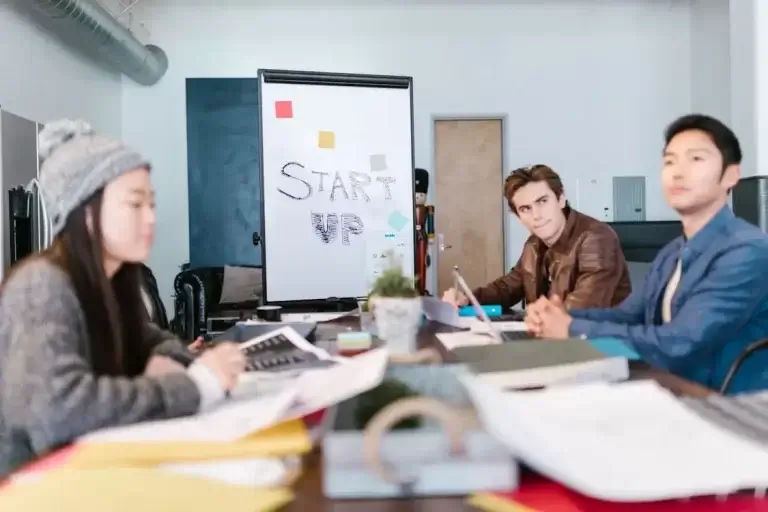 Business owner checking smart growth funding reviews online for authenticity